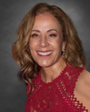 Headshot of Louise Nelson