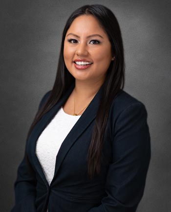 Headshot of Joan Villavicencio