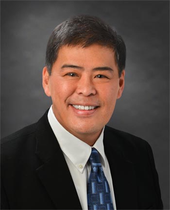 Headshot of Roland Shar