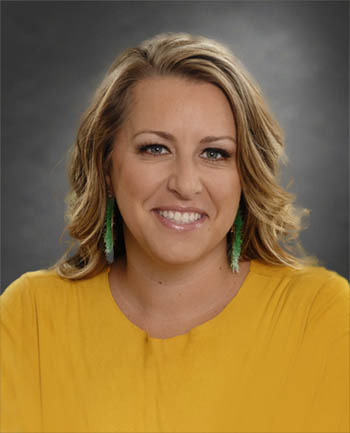 Headshot of Reyna Rousseau