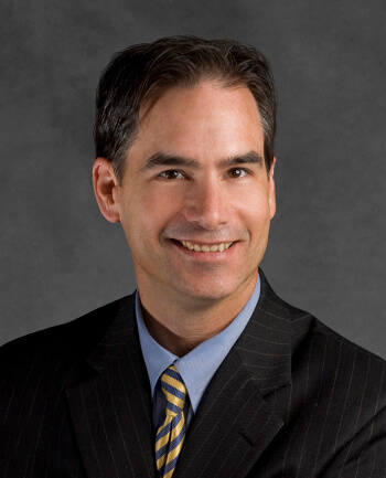 Headshot of Dake Carroll, CMA