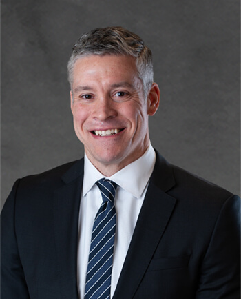 Headshot of Aaron Coker