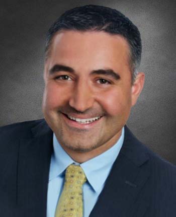 Headshot of John Theologis