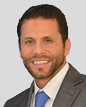 Headshot of Travis R. Tolibas