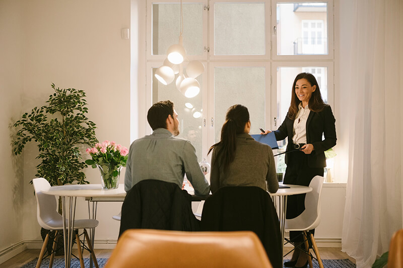 A couple meeting with loan officer